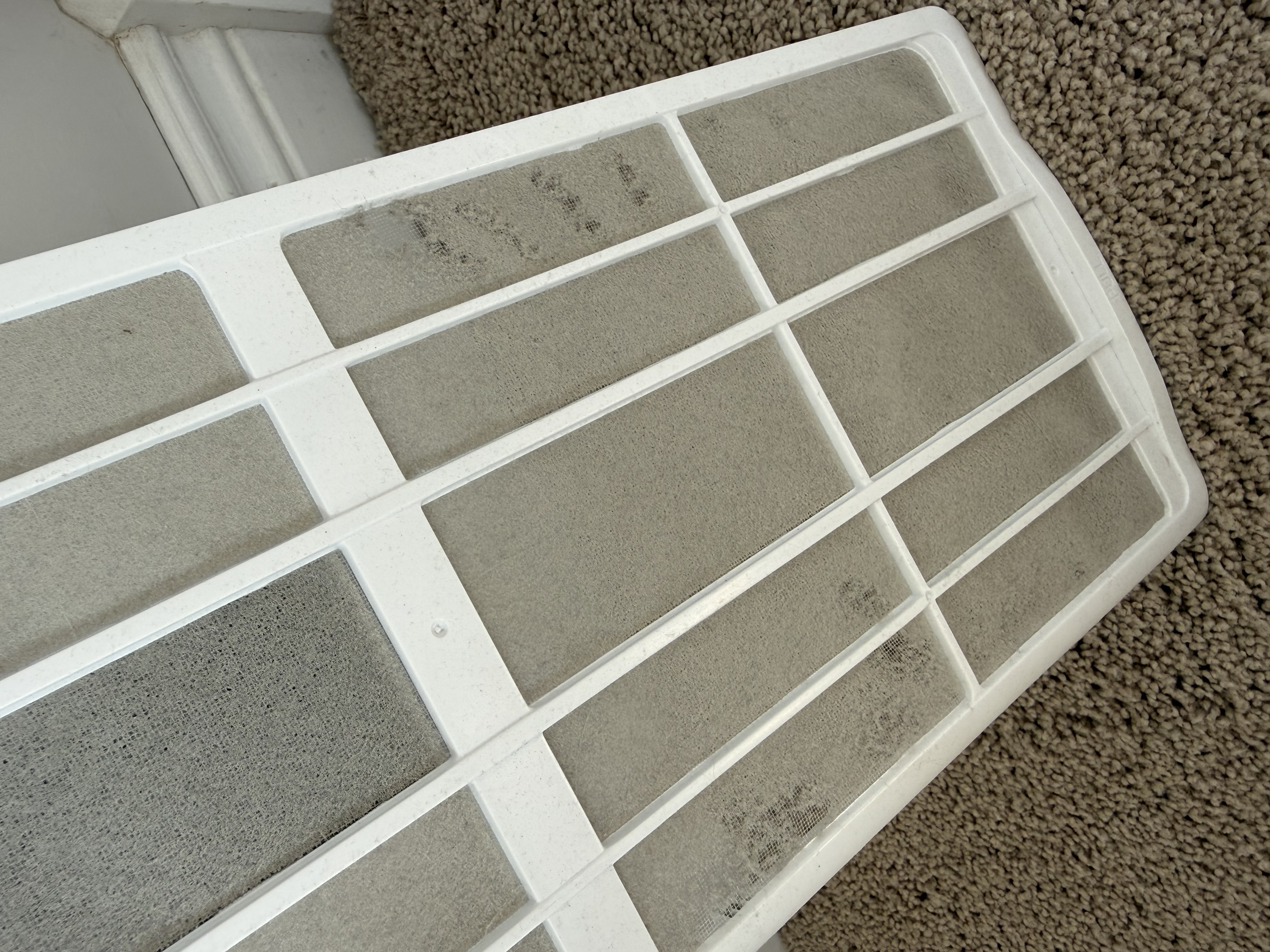 Dust filter caked with dust before cleaning